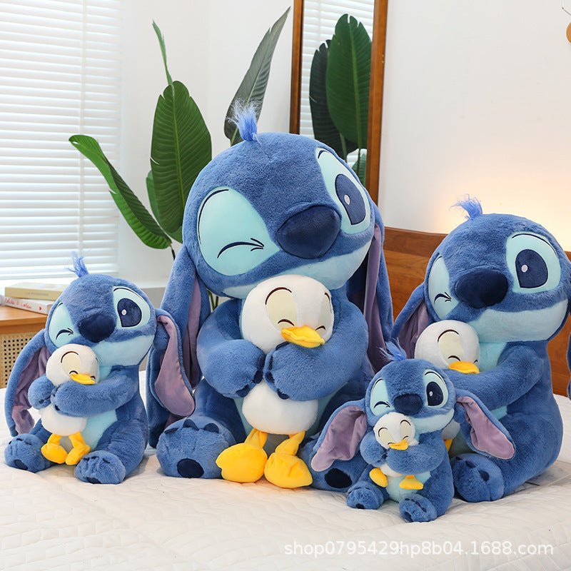 💙 Stitch Star™ – Peluche Grande de Stitch con Diseño de Patito Japonés
