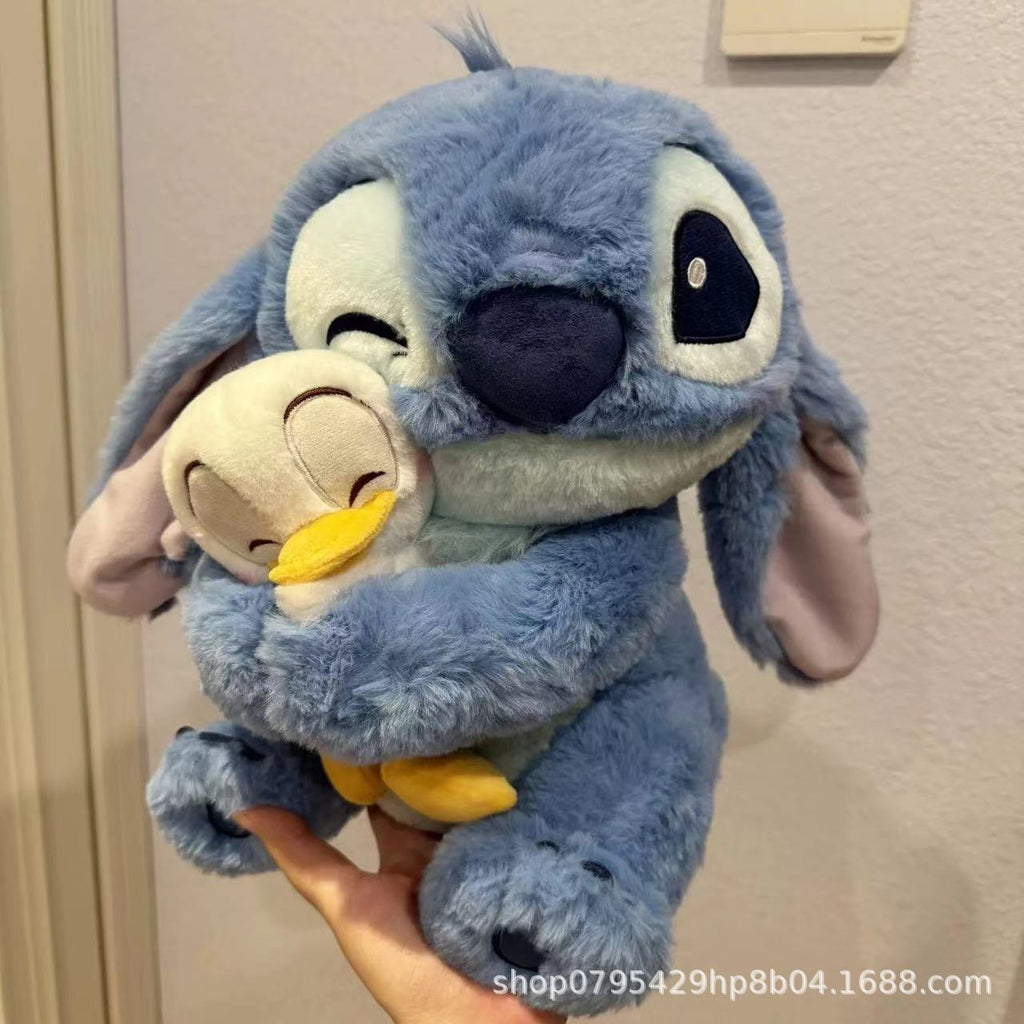 💙 Stitch Star™ – Peluche Grande de Stitch con Diseño de Patito Japonés